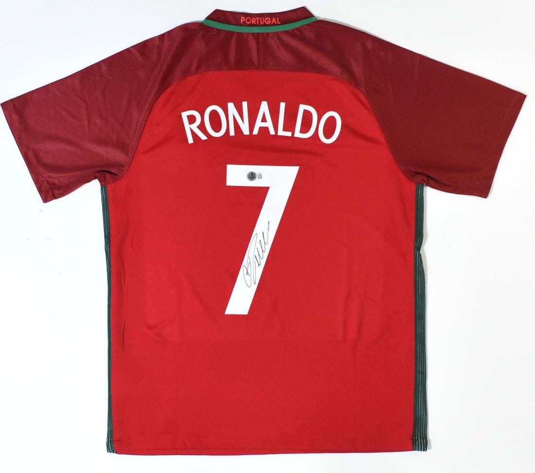 Portugal Home Jersey Signed by Cristiano Ronaldo with Beckett Hologram LOA: Portugal Home Jersey Signed by Cristiano Ronaldo with Beckett Hologram LOA This Portugal home soccer jersey features the iconic number 7 and has been autographed by Cristiano Ronaldo. The jersey is an