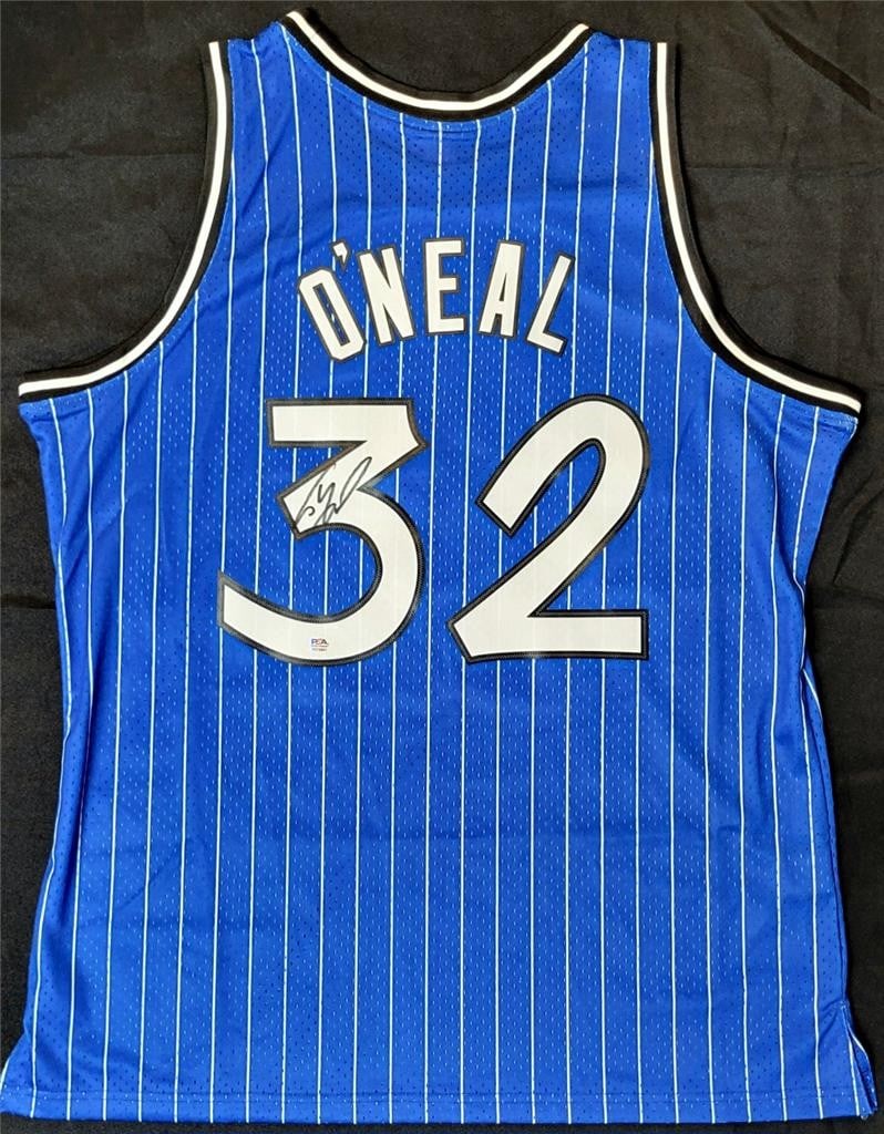 Shaquille O'Neal Signed 1994-95 Orlando Magic Jersey PSA Authenticated: Shaquille O'Neal Signed 1994-95 Orlando Magic Jersey PSA Authenticated Own a piece of basketball history with this original Shaquille O'Neal signed Mitchell & Ness 1994-95 Orlando Magic jersey. This a