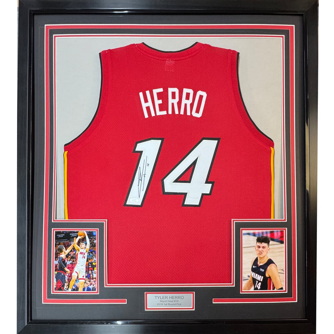 Framed Autographed Tyler Herro Miami Heat Basketball Jersey JSA COA: Framed Autographed Tyler Herro Miami Heat Basketball Jersey JSA COA Celebrate your love for basketball with this stunning framed autographed Tyler Herro Miami Red Basketball Jersey. Measuring 33x42 in
