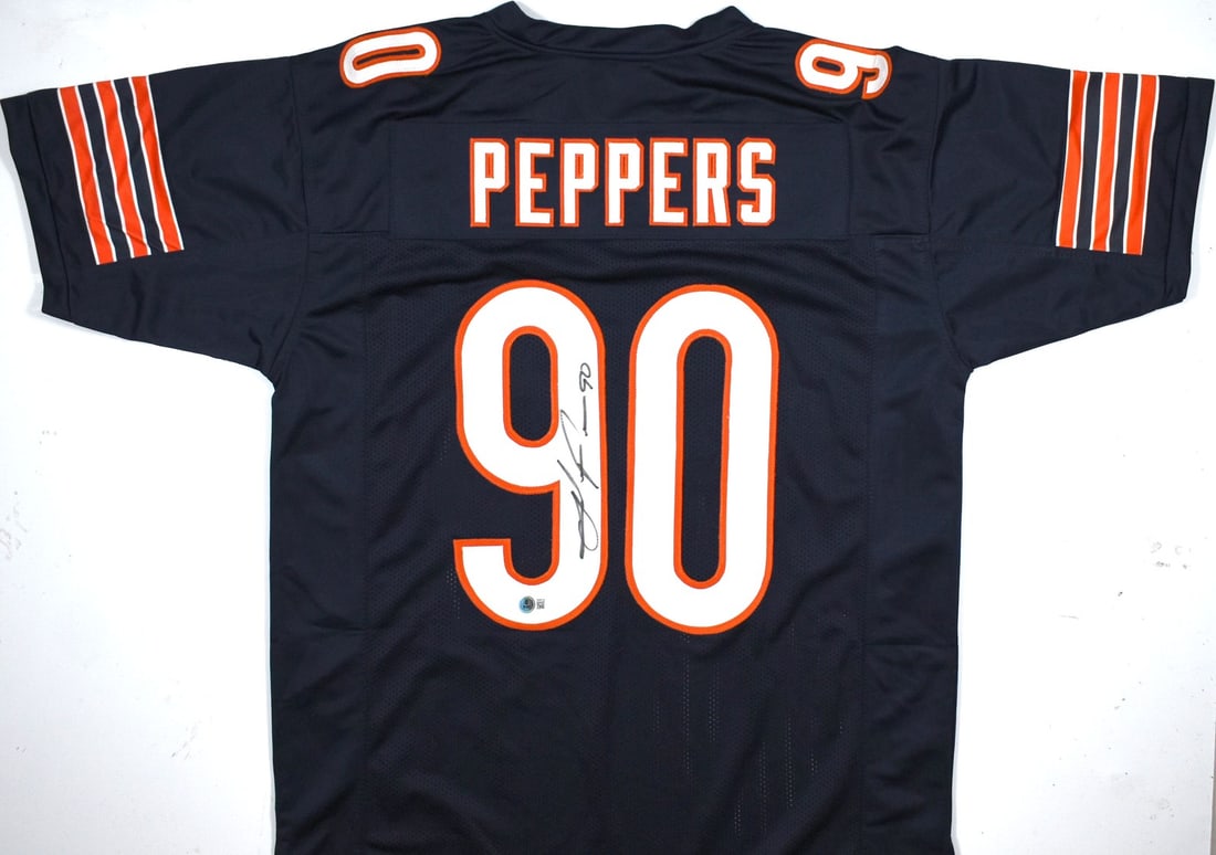 Julius Peppers Signed Chicago Bears Blue Jersey Beckett Authenticated: Julius Peppers Signed Chicago Bears Blue Jersey Beckett Authenticated This is an original, pre-owned blue pro style jersey signed by NFL star Julius Peppers, featuring the Chicago Bears team colors. T