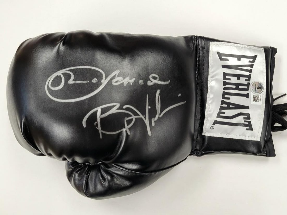 Boxing Glove Signed by Roman Gonzalez and Brian Viloria Beckett Authenticated: Boxing Glove Signed by Roman Gonzalez and Brian Viloria Beckett Authenticated This is a pre-owned boxing glove autographed by Chocolatito Roman Gonzalez and Brian Viloria. The signatures have been aut