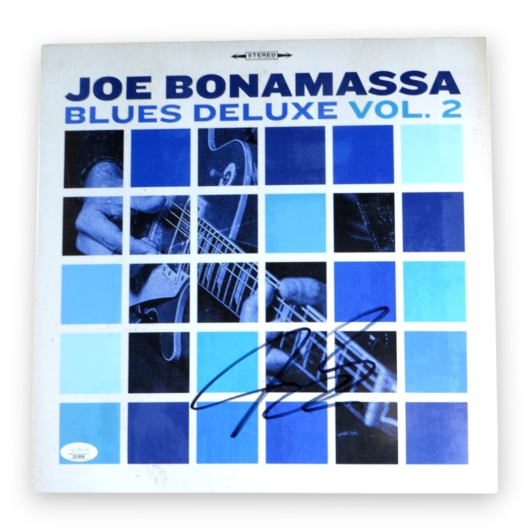 Joe Bonamassa Signed Blues Deluxe Vol 2 Album Cover JSA Authenticated: Joe Bonamassa Signed Blues Deluxe Vol 2 Album Cover JSA Authenticated This is an original record album cover of "Blues Deluxe Vol 2" signed by renowned blues guitarist Joe Bonamassa. The item includes