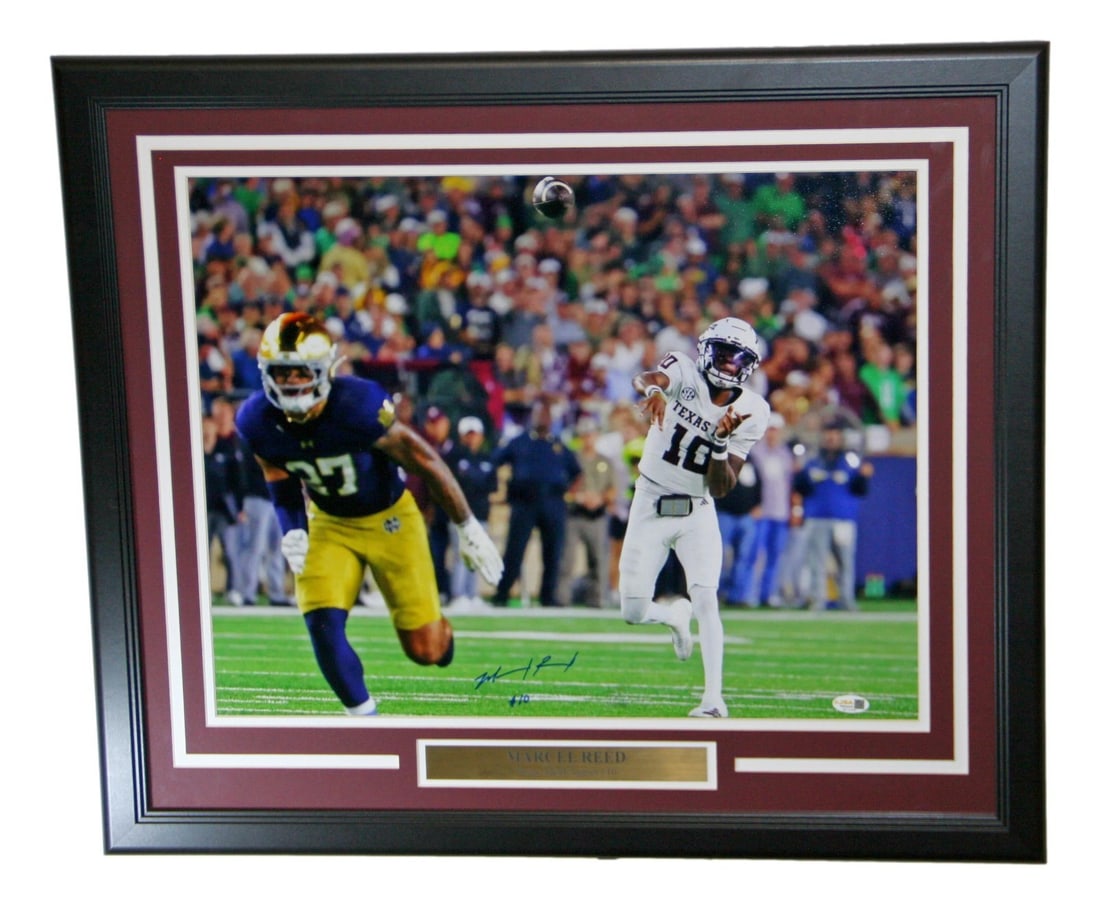 Marcel Reed Signed Texas A&M Aggies 16x20 Photo Framed JSA Authenticated: Marcel Reed Signed Texas A&M Aggies 16x20 Photo Framed JSA Authenticated This is a framed 16x20 photograph of Marcel Reed, a notable player from the Texas A&M Aggies football team. The photo features 