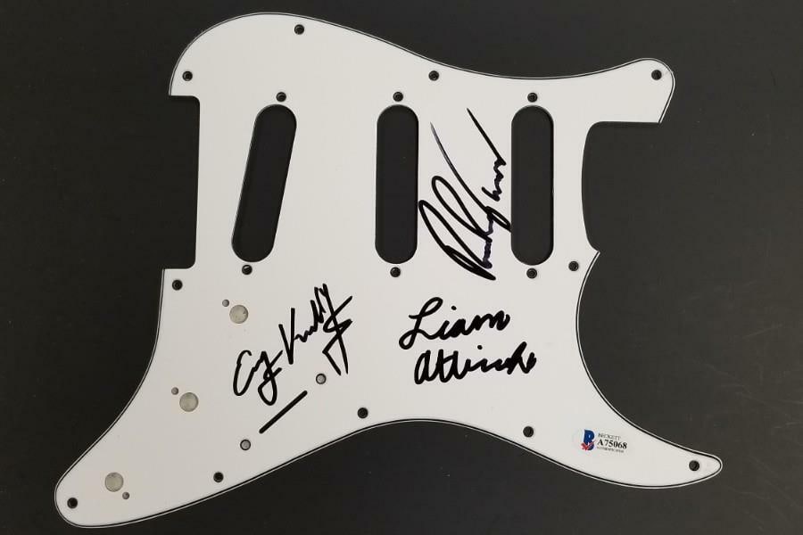 Kelly Garcia Autographed Guitar Pickguard with BAS Beckett COA: Kelly Garcia Autographed Guitar Pickguard with BAS Beckett COA This is an original guitar pickguard signed by Forever In Your Mind members Kelly and Garcia. The item comes with a Beckett Certificate o