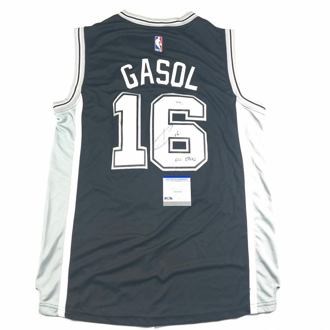 Pau Gasol San Antonio Spurs Autographed Jersey PSA/DNA Certified: Pau Gasol San Antonio Spurs Autographed Jersey PSA/DNA Certified This is an original, pre-owned jersey autographed by Pau Gasol, a renowned player of the San Antonio Spurs in the NBA. The jersey featu