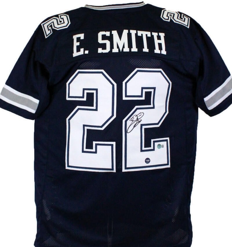 Blue Dallas Cowboys Jersey Signed by Emmitt Smith Beckett Authenticated: Blue Dallas Cowboys Jersey Signed by Emmitt Smith Beckett Authenticated This blue pro style jersey features an authentic autograph from Emmitt Smith, legendary player of the Dallas Cowboys. The jersey