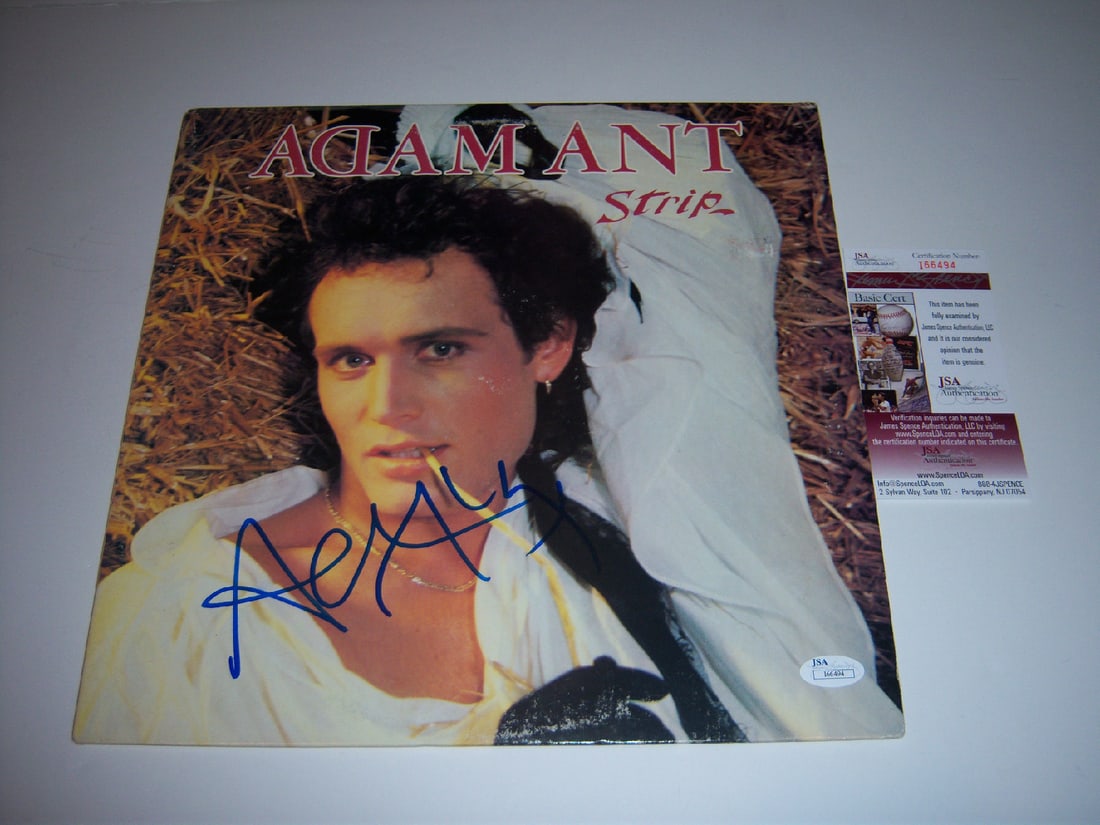 Signed Adam Ant LP Album with JSA Certificate of Authenticity: Signed Adam Ant LP Album with JSA Certificate of Authenticity This is an original "Strip" LP record album by Adam Ant, signed and accompanied by JSA/COA authentication. The album originates from the U