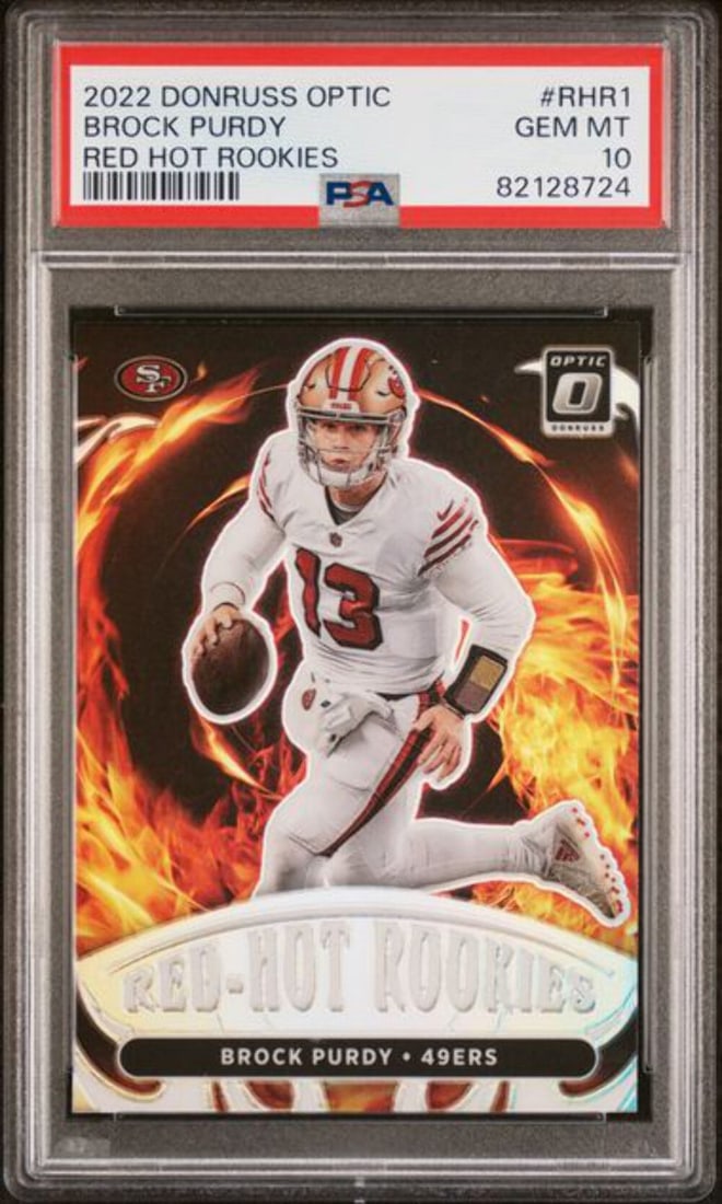 2022 Donruss Optic Brock Purdy #RHR1 PSA 10 Red Hot Rookies Card: 2022 Donruss Optic Brock Purdy #RHR1 PSA 10 Red Hot Rookies Card Introducing the 2022 Donruss Optic Brock Purdy #RHR1 Red Hot Rookies Football Card, graded at PSA 10 for its exceptional quality. This 