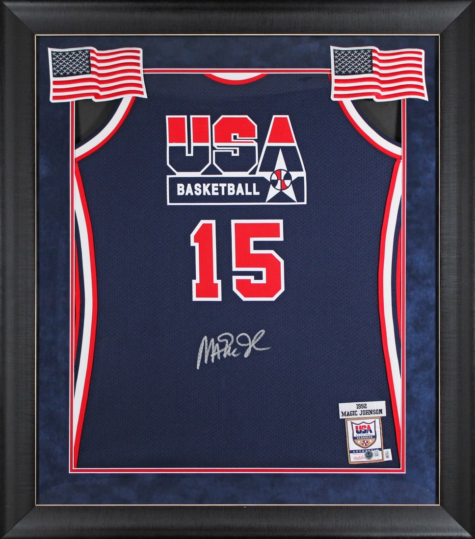 Framed 1992 Navy USA Basketball Jersey Signed by Magic Johnson BAS Witnessed: Framed 1992 Navy USA Basketball Jersey Signed by Magic Johnson BAS Witnessed This professionally framed navy Mitchell & Ness 1992 USA Basketball Classics Swingman jersey has been personally signed by 