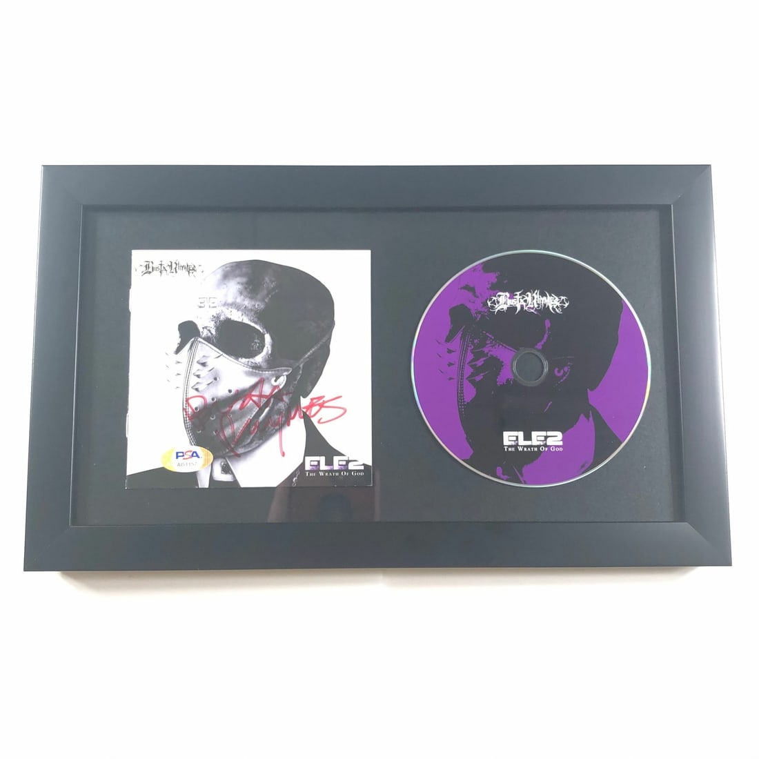 Framed ELE 2 CD Cover Signed by Busta Rhymes with PSA/DNA Authentication: Framed ELE 2 CD Cover Signed by Busta Rhymes with PSA/DNA Authentication This is a framed CD cover and booklet for Busta Rhymes' "ELE 2," personally signed by Busta Rhymes. The autograph has been auth