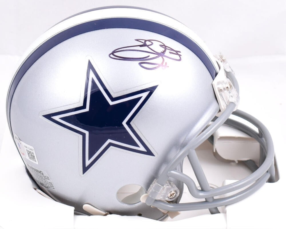 Emmitt Smith Signed Dallas Cowboys Mini Helmet Beckett Authenticated: Emmitt Smith Signed Dallas Cowboys Mini Helmet Beckett Authenticated This is an original mini helmet autographed by Emmitt Smith, the legendary running back of the Dallas Cowboys. The helmet showcases