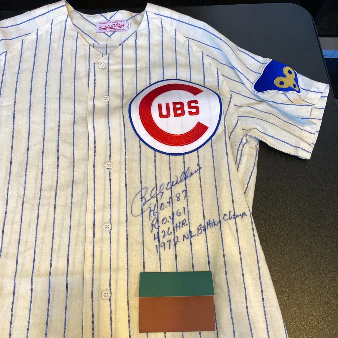 Billy Williams Signed Mitchell & Ness Chicago Cubs Jersey with UDA COA: Billy Williams Signed Mitchell & Ness Chicago Cubs Jersey with UDA COA This authentic Mitchell & Ness Chicago Cubs jersey is beautifully signed by Billy Williams, featuring extensive inscriptions that