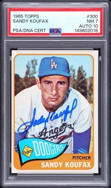 1965 Topps Sandy Koufax Signed Card PSA 7 Auto Grade 10: 1965 Topps Sandy Koufax Signed Card PSA 7 Auto Grade 10 This is a 1965 Topps baseball card featuring Sandy Koufax of the Los Angeles Dodgers. The card is hand signed by Sandy Koufax and has been profe