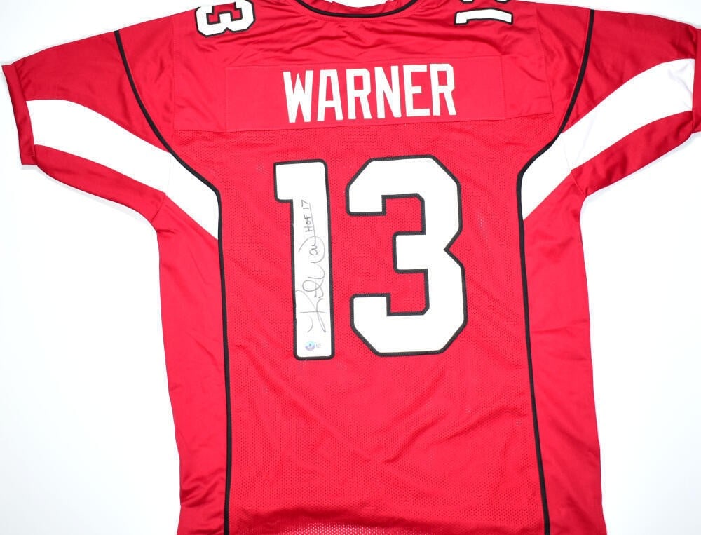 Kurt Warner Autographed Arizona Cardinals Pro Jersey Beckett Authenticated: Kurt Warner Autographed Arizona Cardinals Pro Jersey Beckett Authenticated This authentic Kurt Warner autographed red Pro Style jersey is a must-have for any Arizona Cardinals fan. The jersey features