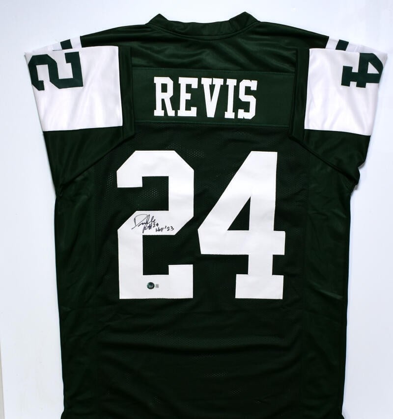 Green Pro Style Jersey Signed by Darrelle Revis with Beckett Authentication: Green Pro Style Jersey Signed by Darrelle Revis with Beckett Authentication This autographed green pro style jersey features the signature of Darrelle Revis, a standout player for the New York Jets. T