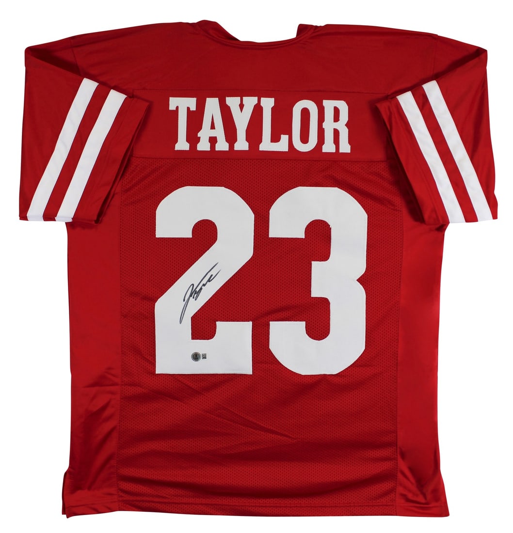 Jonathan Taylor Signed Wisconsin Badgers Red Jersey BAS Authenticated: Jonathan Taylor Signed Wisconsin Badgers Red Jersey BAS Authenticated Celebrate your passion for football with this authentic, autographed red pro-style jersey signed by Jonathan Taylor of the Wiscons