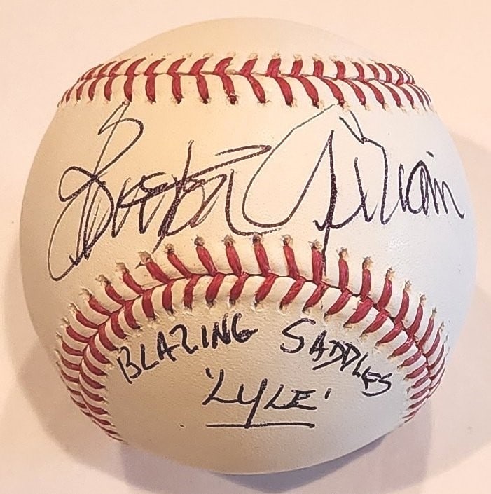 OML Baseball Signed by Burton Gilliam as Lyle Blazing Saddles JSA Authenticated: OML Baseball Signed by Burton Gilliam as Lyle Blazing Saddles JSA Authenticated This Official Major League (OML) baseball is autographed by Burton Gilliam, known for his role as Lyle in Blazing Saddle