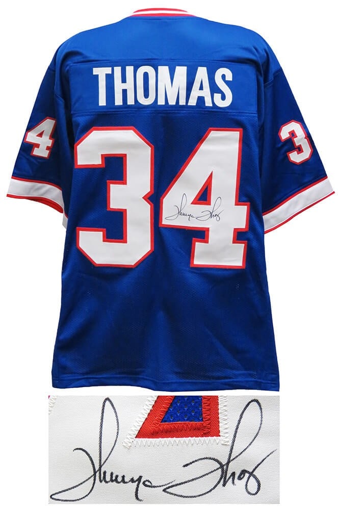 Thurman Thomas Signed Buffalo Bills Blue Jersey with COA: Thurman Thomas Signed Buffalo Bills Blue Jersey with COA This is a signed blue throwback custom football jersey of Thurman Thomas, the renowned running back for the Buffalo Bills. The jersey is an ori