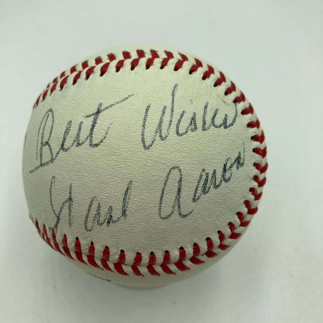 Hank Aaron Signed 1970s Atlanta Braves Baseball with JSA COA: Hank Aaron Signed 1970s Atlanta Braves Baseball with JSA COA This is a vintage 1970's Atlanta Braves baseball signed by the legendary player Hank Aaron, accompanied by a full letter of authentication 