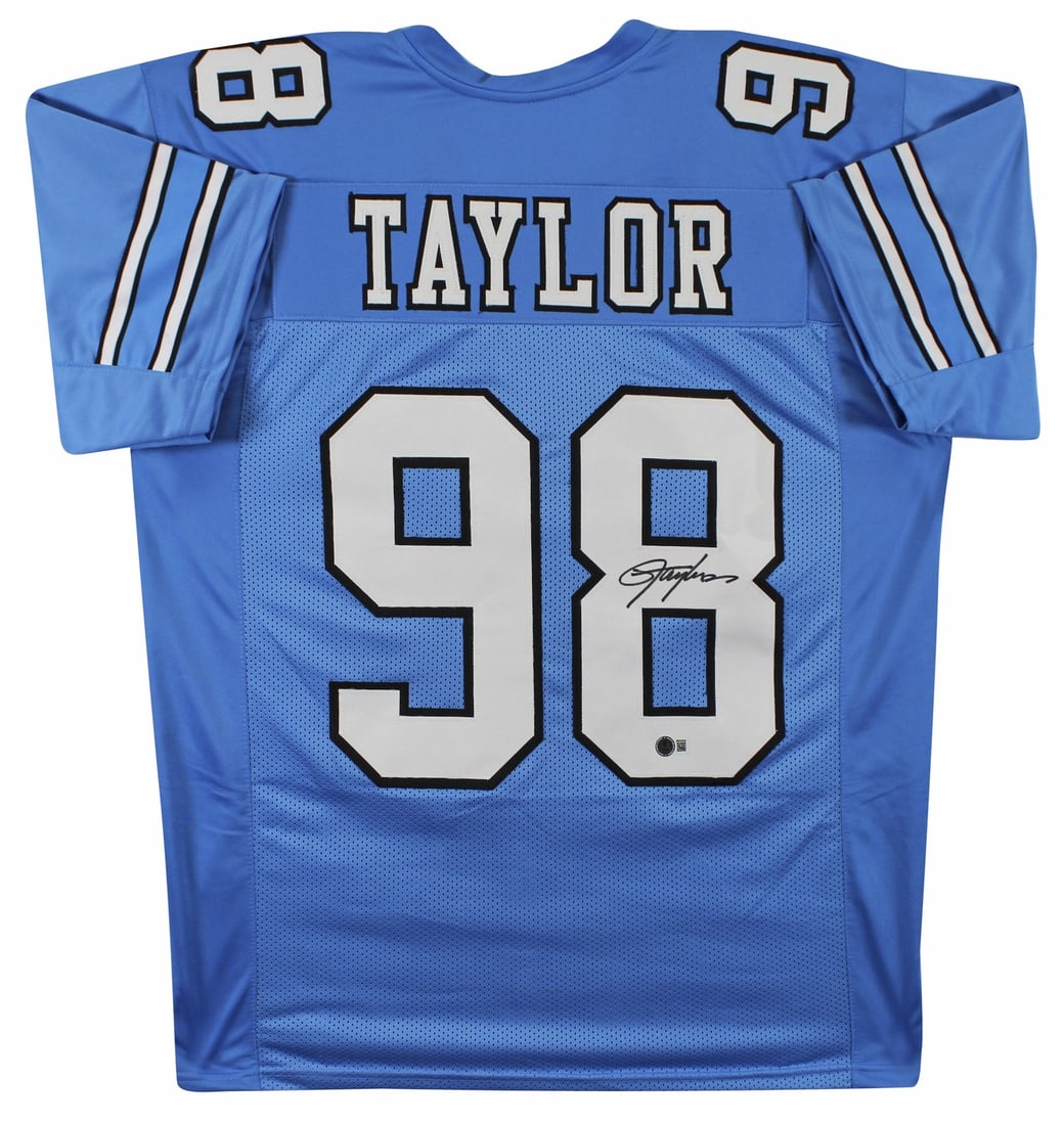 Lawrence Taylor Signed Light Blue Jersey North Carolina Tar Heels BAS Witnessed: Lawrence Taylor Signed Light Blue Jersey North Carolina Tar Heels BAS Witnessed Celebrate the legacy of football with this authentic light blue pro style jersey, personally signed by Lawrence Taylor o