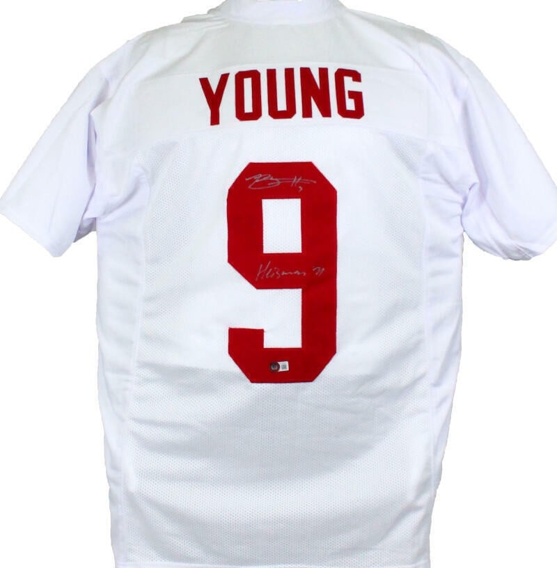 White College Jersey Signed by Bryce Young with Beckett Authentication: White College Jersey Signed by Bryce Young with Beckett Authentication This white college style jersey features the autograph of Bryce Young, accompanied by a Beckett authentication hologram. The jers