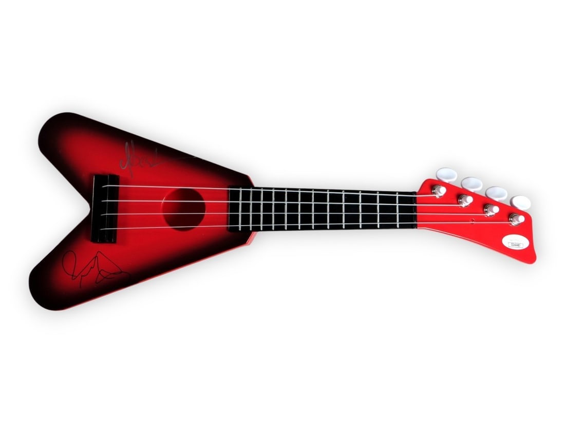 Sebastian Bach Rudy Sarzo Signed Mini Guitar JSA Authenticated: Sebastian Bach Rudy Sarzo Signed Mini Guitar JSA Authenticated This is an authentic mini guitar signed by legendary musicians Sebastian Bach and Rudy Sarzo, featuring a professional authentication fro