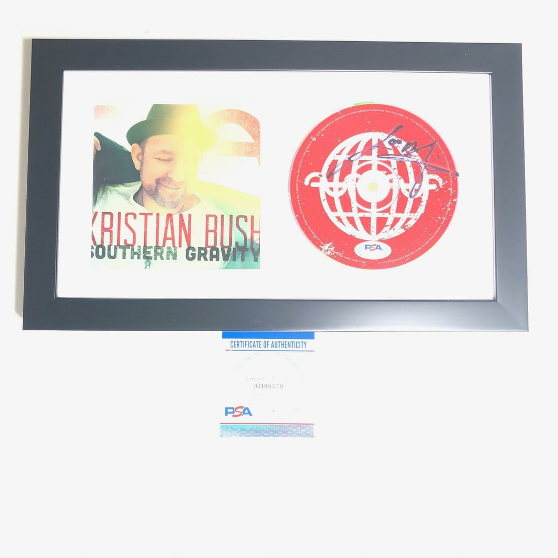 Kristian Bush Signed CD & Booklet PSA/DNA Certified Framed Southern Gravity: Kristian Bush Signed CD & Booklet PSA/DNA Certified Framed Southern Gravity This is a framed CD signed by Kristian Bush, the renowned artist known for his work in country music. The signature has been