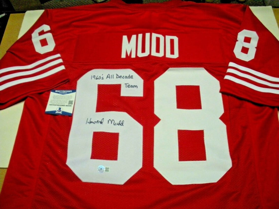 Signed Howard Mudd 49ers 1960s All-Decade Jersey with Beckett COA: Signed Howard Mudd 49ers 1960s All-Decade Jersey with Beckett COA This pre-owned San Francisco 49ers jersey features the signature of Howard Mudd, a member of the NFL's 1960s All-Decade Team. The jers