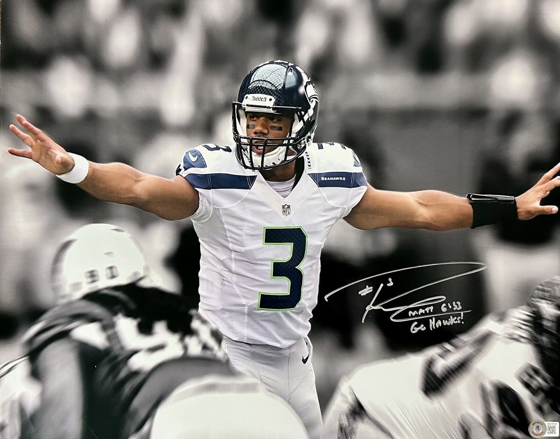 Russell Wilson Signed 16x20 Super Bowl Photograph Beckett Certified: Russell Wilson Signed 16x20 Super Bowl Photograph Beckett Certified This autographed 16x20 photograph features Russell Wilson, the former Seattle Seahawks quarterback and Super Bowl Champion. The sign