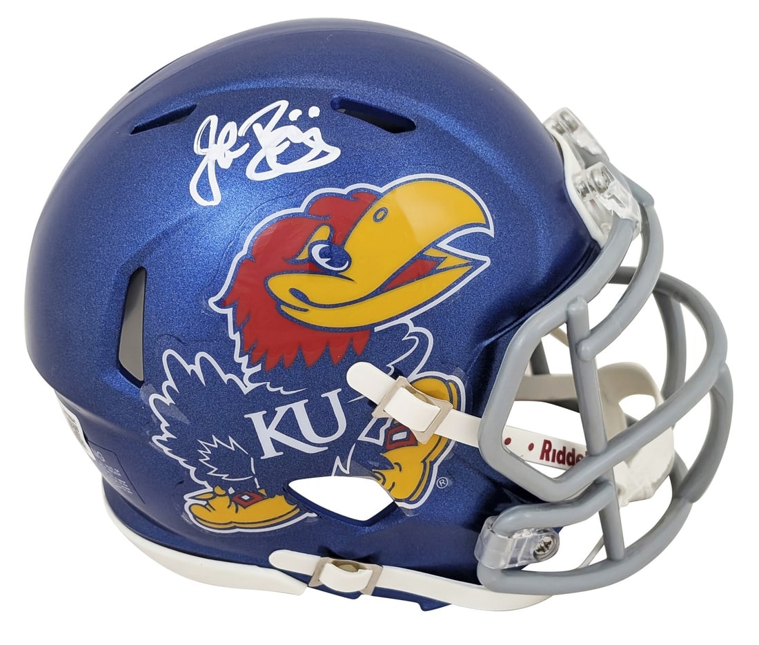 John Riggins Autographed Kansas Jayhawks Mini Helmet BAS Witnessed: John Riggins Autographed Kansas Jayhawks Mini Helmet BAS Witnessed This authentic mini helmet is a must-have for any Kansas Jayhawks fan and football enthusiast. Personally signed by legendary player 
