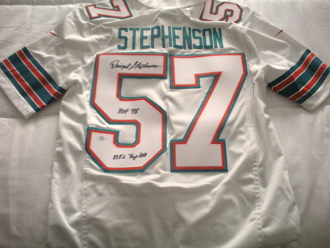 Nike Miami Dolphins Jersey Signed by Dwight Stephenson with Beckett COA: Nike Miami Dolphins Jersey Signed by Dwight Stephenson with Beckett COA This pre-owned official licensed Nike jersey features the signature of Dwight Stephenson from the Miami Dolphins. The jersey is 