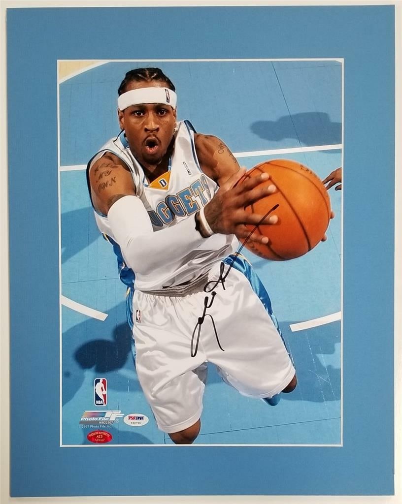 Matted 11x15 Denver Nuggets Photo Signed by Allen Iverson With PSA Sticker: Matted 11x15 Denver Nuggets Photo Signed by Allen Iverson With PSA Sticker This is an original 11x15 photo featuring Allen Iverson of the Denver Nuggets, signed by Allen Iverson. The photo is matted a