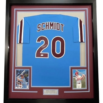 Mike Schmidt signed framed Phillies jersey 33x42 JSA COA: Mike Schmidt signed framed Phillies jersey 33x42 JSA COA This professionally framed and matted Philadelphia blue jersey is autographed by Mike Schmidt. The display includes two 8x10 photographs and me