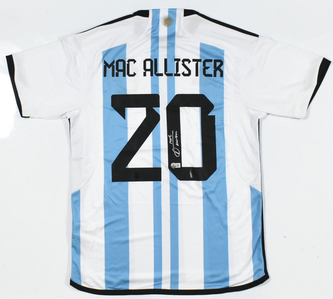 Argentina Home Jersey Signed by Alexis Mac Allister Beckett Authenticated XL: Argentina Home Jersey Signed by Alexis Mac Allister Beckett Authenticated XL This Argentina home soccer jersey features the signature of Alexis Mac Allister and showcases his number 20. It is an origi