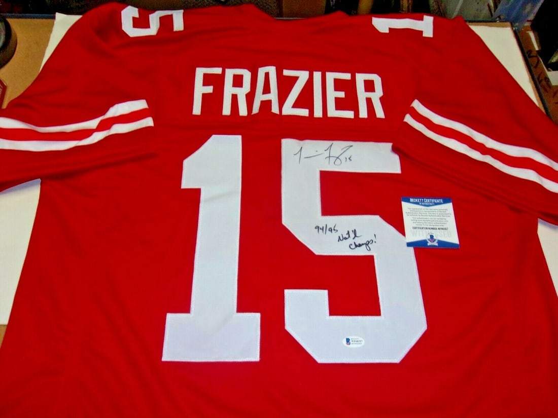 Signed Nebraska Cornhuskers Tommie Frazier 94 95 National Champions Jersey: Signed Nebraska Cornhuskers Tommie Frazier 94 95 National Champions Jersey This pre-owned Nebraska Cornhuskers jersey celebrates the 1994/95 national championship seasons and is signed by Tommie Frazi