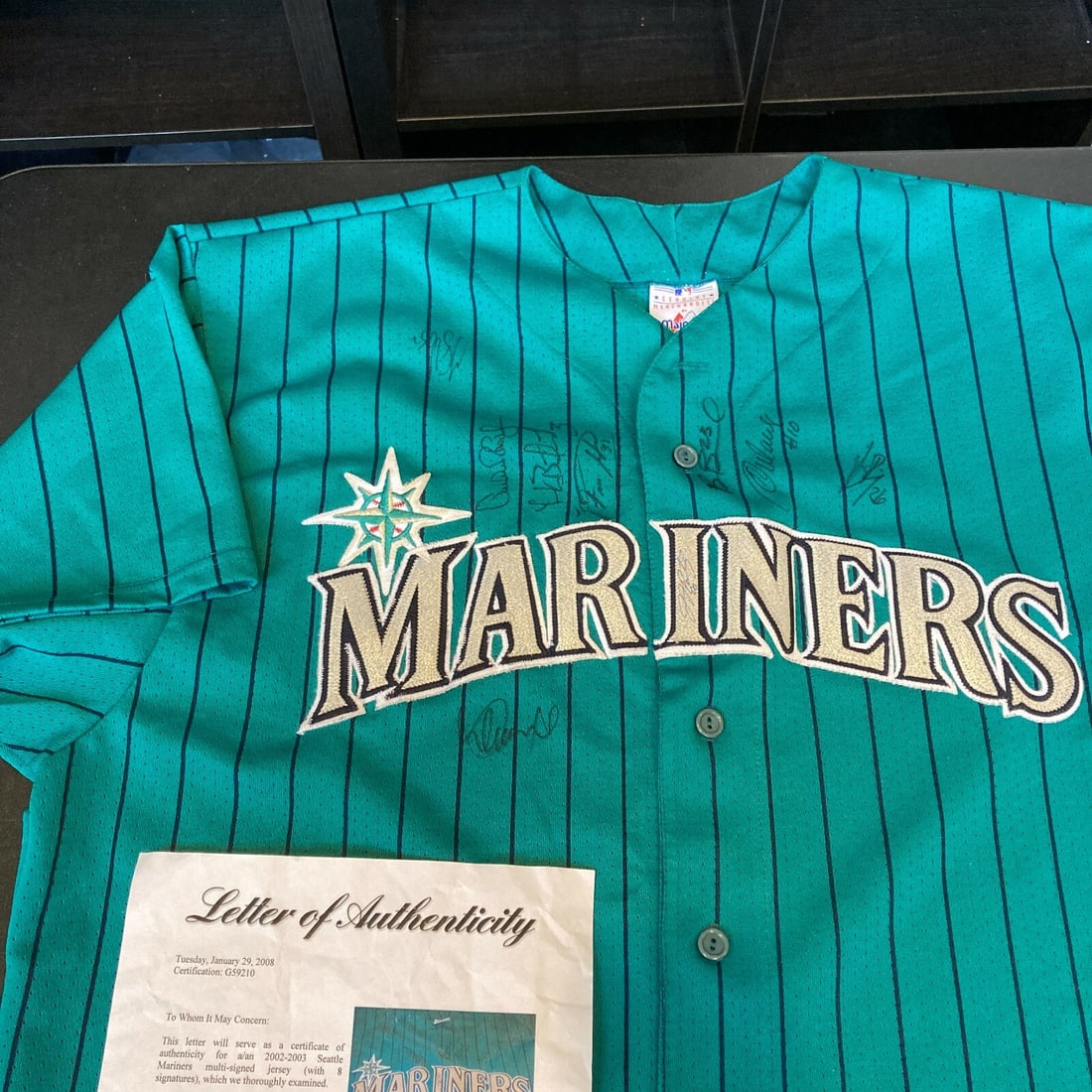 2002 Mariners Team Jersey Signed by Ichiro Suzuki and Felix Hernandez PSA DNA: 2002 Mariners Team Jersey Signed by Ichiro Suzuki and Felix Hernandez PSA DNA This is an original 2002 Seattle Mariners jersey signed by Ichiro Suzuki, Felix Hernandez, and additional team members. Th
