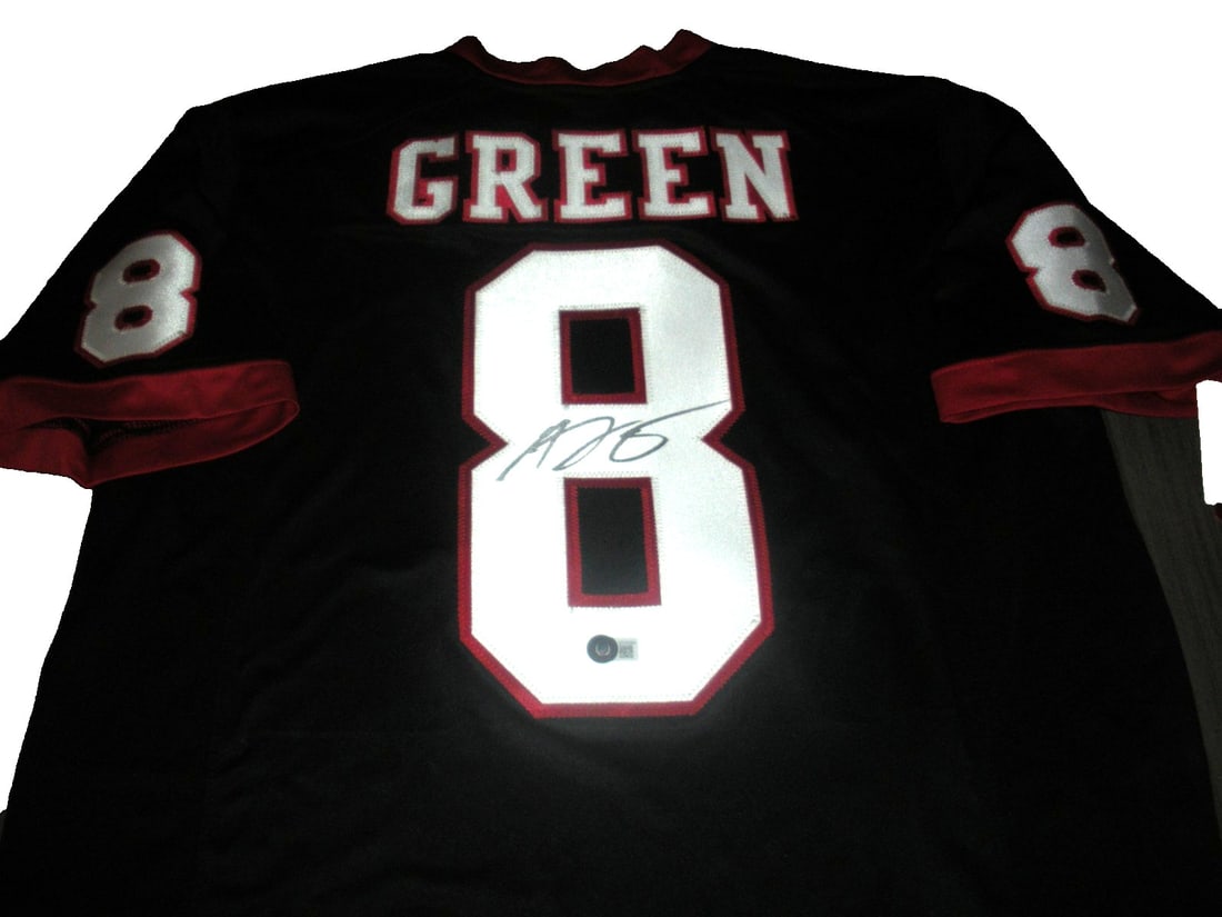 AJ Green Signed Georgia Bulldogs Nike Jersey with Beckett COA: AJ Green Signed Georgia Bulldogs Nike Jersey with Beckett COA This official licensed Nike jersey features the signature of AJ Green, a celebrated player from the Georgia Bulldogs football team. This o