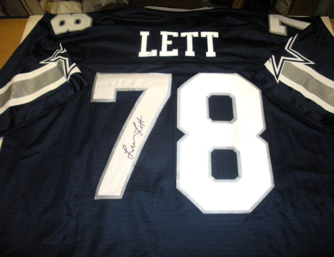Signed Dallas Cowboys ProLine Jersey with Leon Lett Autograph and COA: Signed Dallas Cowboys ProLine Jersey with Leon Lett Autograph and COA This is an official licensed Proline Dallas Cowboys jersey signed by Leon Lett, a notable linebacker for the team. The jersey is a