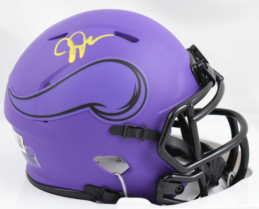 Justin Jefferson Signed Vikings Mini Helmet Beckett Authenticated: Justin Jefferson Signed Vikings Mini Helmet Beckett Authenticated This is a pre-owned mini helmet featuring the autograph of Justin Jefferson, a standout player for the Minnesota Vikings. The helmet i