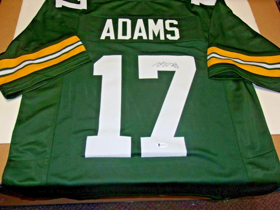 Signed Davante Adams Football Jersey with Beckett COA Green Bay Packers All-Pro: Signed Davante Adams Football Jersey with Beckett COA Green Bay Packers All-Pro This is a pre-owned Green Bay Packers All-Pro jersey signed by Davante Adams. The autograph comes with Beckett Certifica