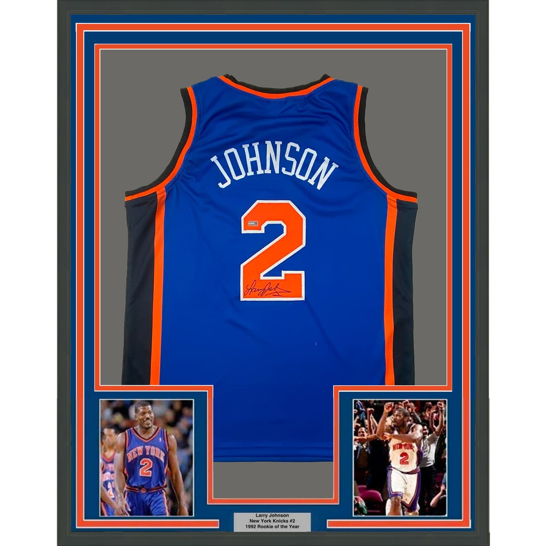 Larry Johnson Signed Knicks Jersey Display 33x42 Steiner Authenticated Framed: Larry Johnson Signed Knicks Jersey Display 33x42 Steiner Authenticated Framed This framed New York Knicks blue jersey is autographed by Larry Johnson and features two 8x10 photographs. The jersey meas