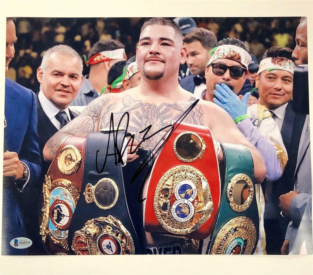 Andy Ruiz Jr Signed 11x14 Boxing Photo Beckett Authenticated vs Anthony Joshua: Andy Ruiz Jr Signed 11x14 Boxing Photo Beckett Authenticated vs Anthony Joshua This is an original 11x14 inch photo featuring Andy Ruiz Jr. in a match against Anthony Joshua. The photo is hand-signed 