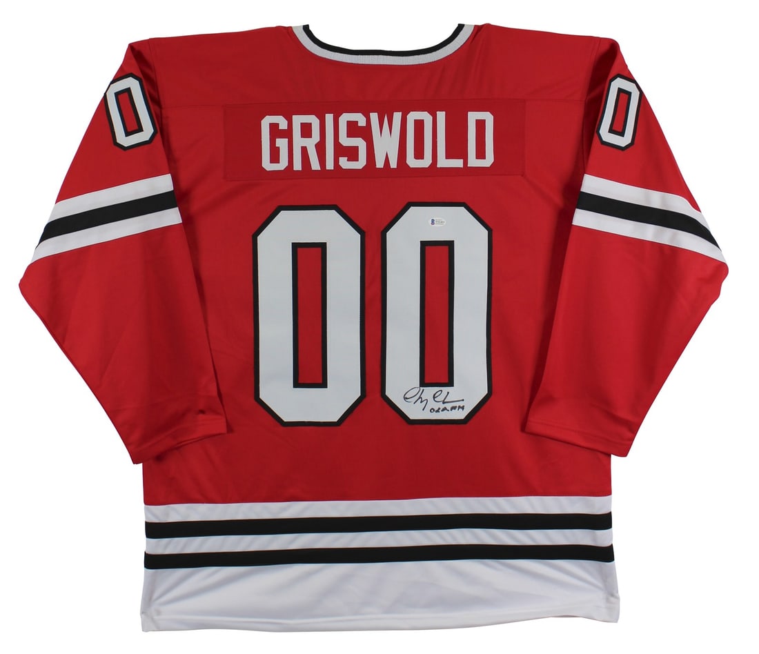 Chevy Chase Signed Red Hockey Jersey with Clark Inscription BAS Authenticated: Chevy Chase Signed Red Hockey Jersey with Clark Inscription BAS Authenticated Own a piece of holiday memorabilia with this autographed red hockey jersey, signed by Chevy Chase, famously known as "Clar
