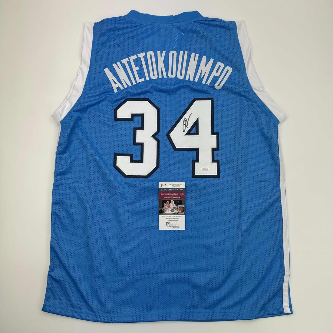 Giannis Antetokounmpo Signed Greece Basketball Jersey JSA COA: Giannis Antetokounmpo Signed Greece Basketball Jersey JSA COA Own a piece of basketball memorabilia with this autographed Giannis Antetokounmpo Greece Blue Basketball Jersey, complete with a James Spe