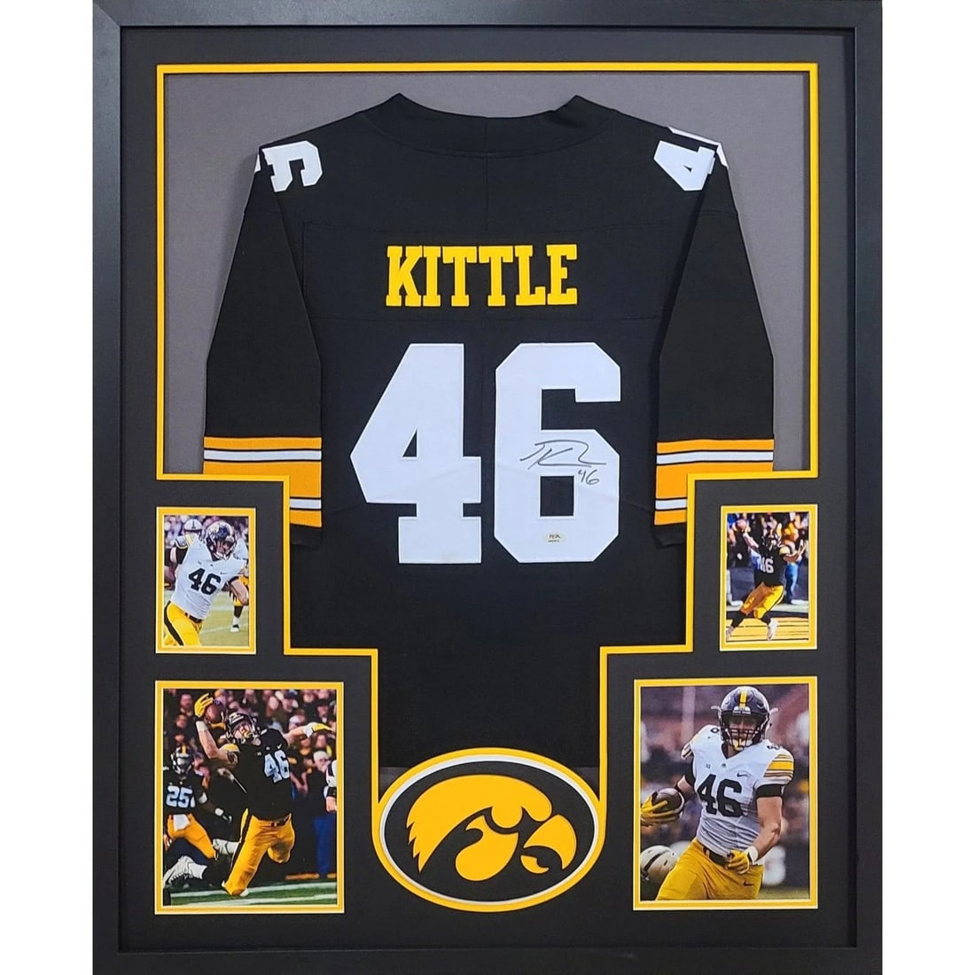 Framed Iowa Hawkeyes Black Jersey Signed by George Kittle with PSA/DNA Authentication: Framed Iowa Hawkeyes Black Jersey Signed by George Kittle with PSA/DNA Authentication This framed black Iowa Hawkeyes jersey is autographed by George Kittle and authenticated by PSA/DNA. The jersey is