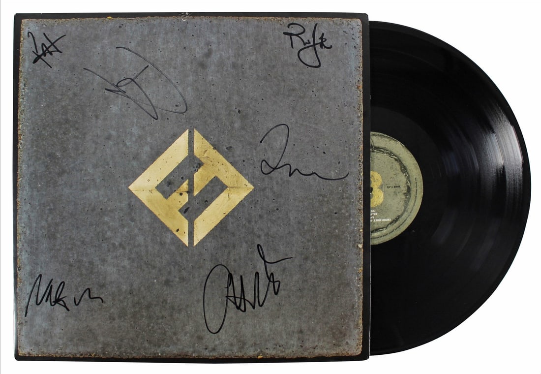 Foo Fighters Signed Album Cover with Vinyl by Grohl Hawkins Smear +3 Beckett COA: Foo Fighters Signed Album Cover with Vinyl by Grohl Hawkins Smear +3 Beckett COA This original Foo Fighters album cover, featuring the signatures of band members Dave Grohl, Taylor Hawkins, Pat Smear,