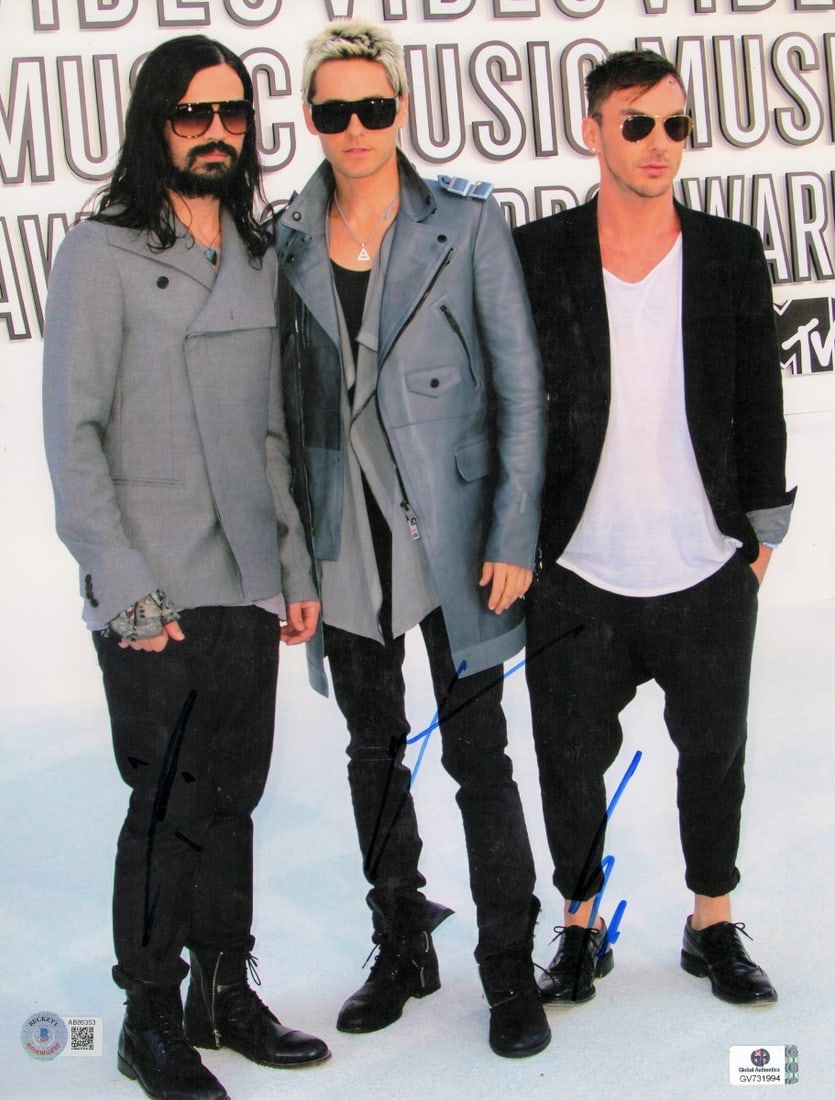 Thirty Seconds to Mars Signed 11X14 Photo Beckett Authenticated: Thirty Seconds to Mars Signed 11X14 Photo Beckett Authenticated This is an autographed 11X14 photograph featuring the band Thirty Seconds to Mars, signed by Jared Leto, Shannon Leto, and Tomo Milicevi
