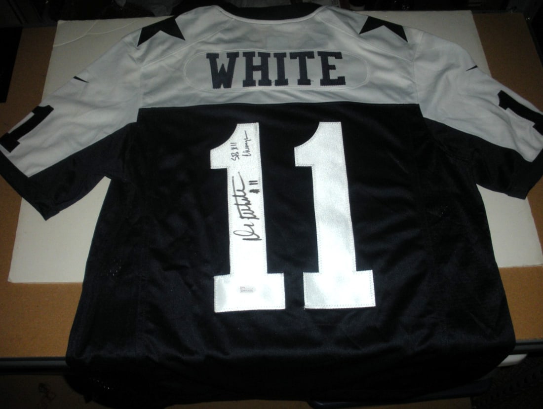 Russell Dallas Cowboys Jersey Signed by Danny White with JSA COA: Russell Dallas Cowboys Jersey Signed by Danny White with JSA COA This is a pre-owned, officially licensed Dallas Cowboys Russell jersey signed by Danny White. The jersey includes JSA/COA authenticatio