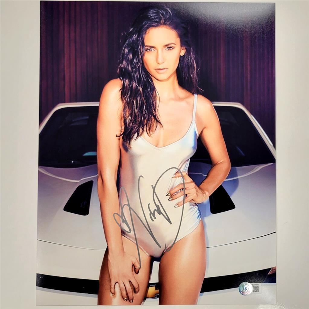 Nina Dobrev Signed 11x14 Photo Vampire Diaries Beckett Authenticated: Nina Dobrev Signed 11x14 Photo Vampire Diaries Beckett Authenticated This is an original 11x14 photo of Nina Dobrev from the show Vampire Diaries, featuring her authentic signature. The autograph has 