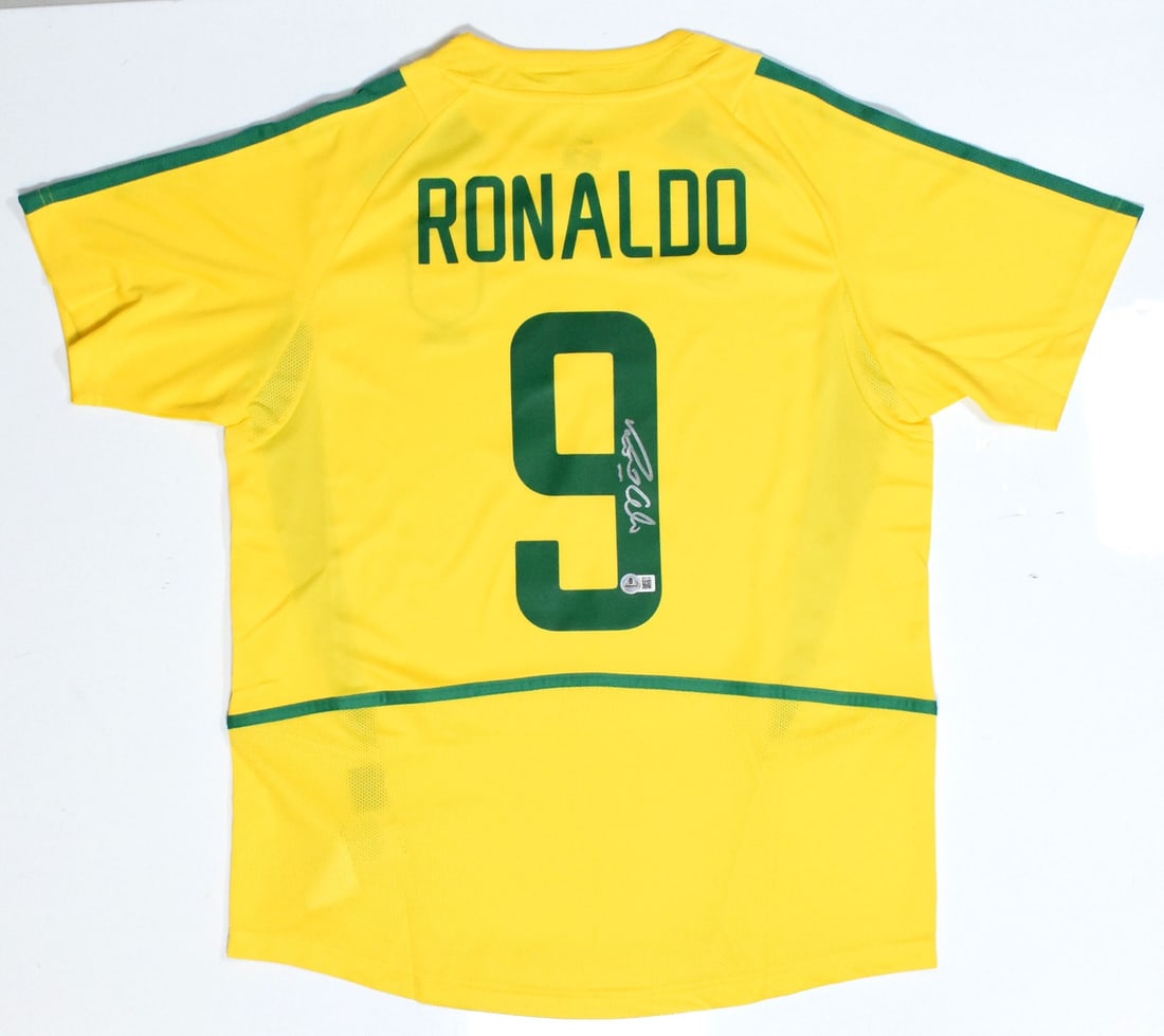 Ronaldo Signed Brazil Home Jersey #9 with Beckett Holo: Ronaldo Signed Brazil Home Jersey #9 with Beckett Holo This is an original, pre-owned Brazil home soccer jersey autographed by the legendary player Ronaldo, featuring his iconic number 9. A must-have 